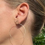 Large single hoop earrings in 18k gold