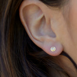 Light grey raw diamond yellow gold studs