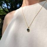 Sapphire & 18k pendant