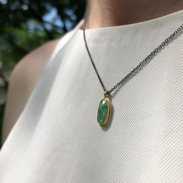 Emerald & 18k pendant