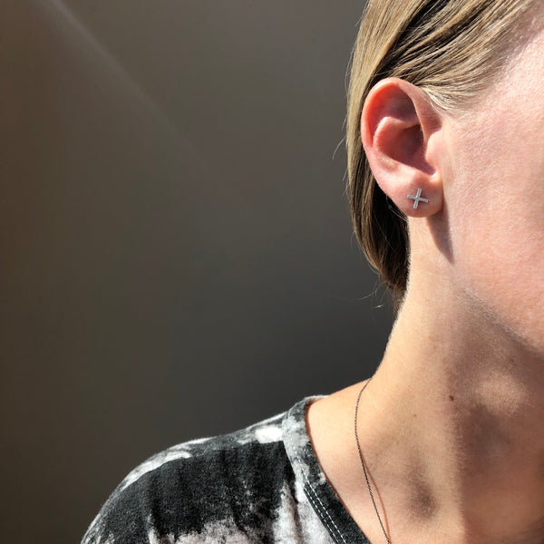 Positive stud earrings in sterling silver, medium