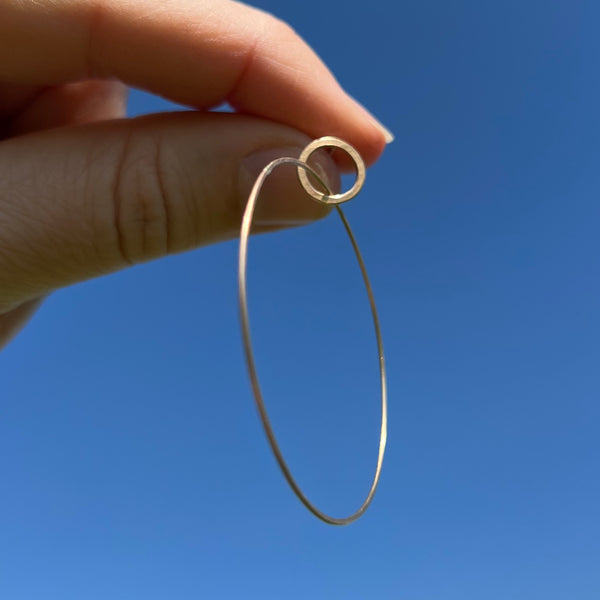 Large Single hoop earrings in 10k gold