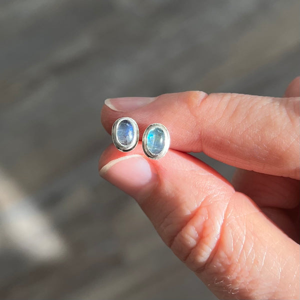 Small oval moonstone studs in sterling silver