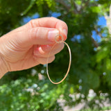 Large single hoop earrings, 18k gold