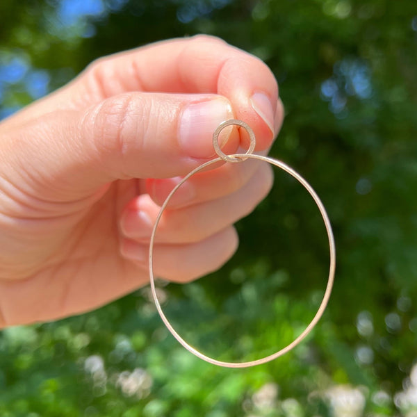 Large single hoop earrings, 18k gold