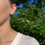 Large single hoop earrings, 18k gold