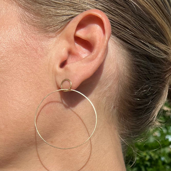 Large single hoop earrings, 18k gold
