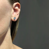 Small oval moonstone studs in oxidized sterling silver