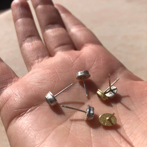 Small oval moonstone studs in sterling silver